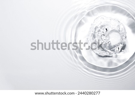 A photo of a clear water surface with natural water circles, soft and beautiful.