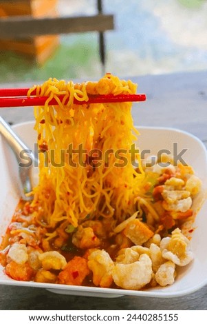 "Kuay Teaw" Is Thai style noodles Can be found everywhere on the street, cheap, available in many flavors Royalty-Free Stock Photo #2440285155