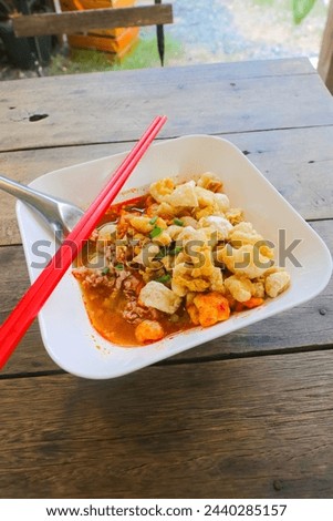 "Kuay Teaw" Is Thai style noodles Can be found everywhere on the street, cheap, available in many flavors Royalty-Free Stock Photo #2440285157
