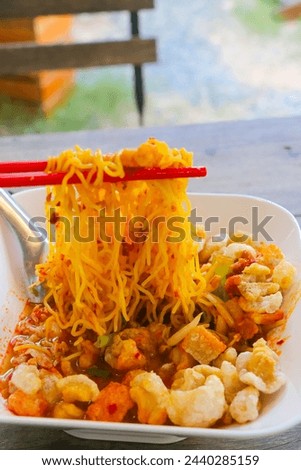 "Kuay Teaw" Is Thai style noodles Can be found everywhere on the street, cheap, available in many flavors Royalty-Free Stock Photo #2440285159