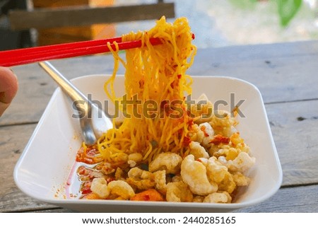 "Kuay Teaw" Is Thai style noodles Can be found everywhere on the street, cheap, available in many flavors Royalty-Free Stock Photo #2440285165