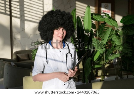 Woman doctor in a modern hospital with a beautiful interior.