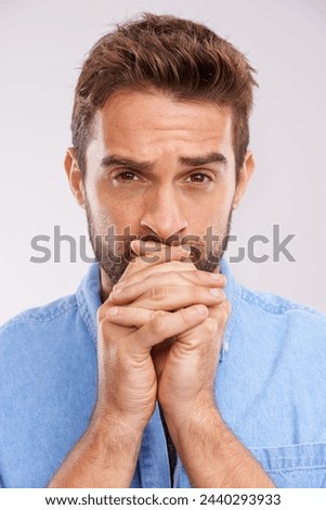 Anxiety, stress and man portrait in studio nervous for results, outcome or suspense on white background. Overwhelmed, worry and male model face with panic expression, overthinking or waiting gesture Royalty-Free Stock Photo #2440293933