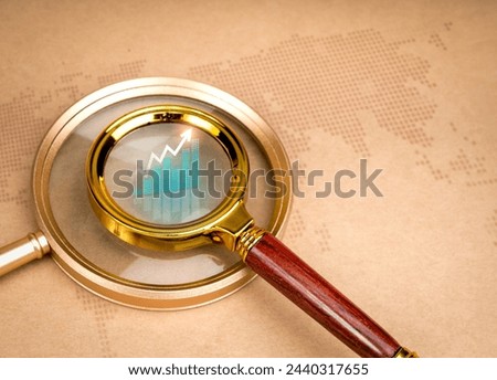 Global customer insights, deep target and trends, finding detail to right goal, specific niche marketing concept. Business growth graph on two sizes magnifying glass on digital world map background.