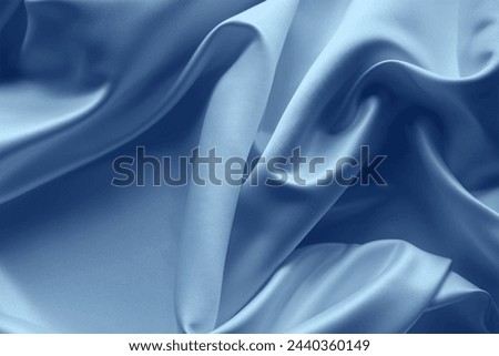 Lines in blue silk fabric
