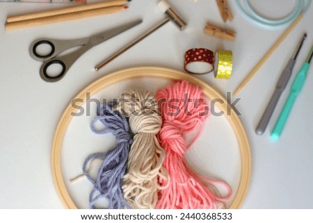 Various craft supplies on white background. Supplies for jewelry making, drawing and needlework. Selective focus.