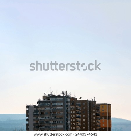 Residential brutalist building with blue sky copy space background creative architecture concept. 