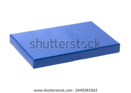 Gift box isolated. Closed blue cardboard box or Kraft paper box. Birthday, Valentine's Day, Mother’s Day anniversary or other holiday. Macro.