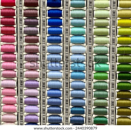 spools of sewing thread in various colors