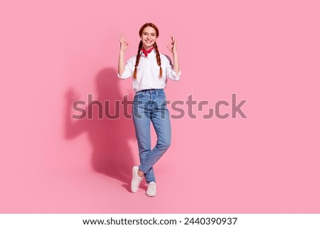 Full length photo of pretty funky lady dressed cowboy outfit showing two okey gestures emtpy space isolated pink color background