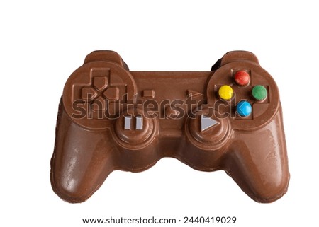Milk chocolate in the shape of a video game controller alongside small rabbits_2.jpg