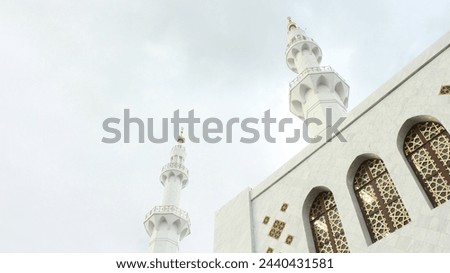 The Majestic White Mosque with Sheikh Zayed Minaret Towers Royalty-Free Stock Photo #2440431581