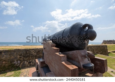 Old colonial artillery cannons on bastion along the coast line of Galle, Southern Province of Sri Lanka Royalty-Free Stock Photo #2440450181
