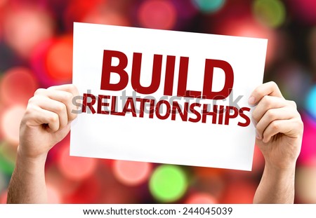 Build Relationships card with colorful background with defocused lights