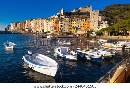 Landscape of picturesque Italian town of Portovenere with fortress walls on Ligurian seaside. Royalty-Free Stock Photo #2440451505