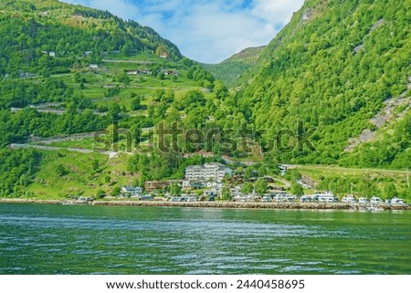 North Geiranger village view of famous road Ørnevegen with hairpin turns up the mountain Møllsbygda Royalty-Free Stock Photo #2440458695