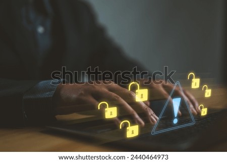 Cybersecurity, Internet cyber crime, Hacker working on computer, Digital crime by an anonymous hacker, System hacked alert after cyberattack, Ransomware, Phishing, Spyware, Compromised information. Royalty-Free Stock Photo #2440464973