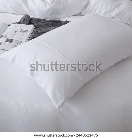 Integrate botanical prints and lush white tones, the pillowcase brings a touch of nature's serenity into the product catalog. Royalty-Free Stock Photo #2440521495