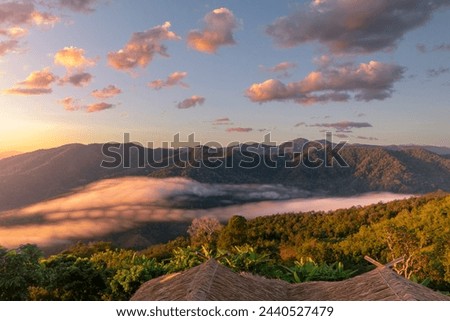 landscape and sky background concept with woman travel, nature of north Thailand, fog-laden valleys, wintery mountain passes of Chiang Mai province,  top view on the mountain sunrise and sunset

