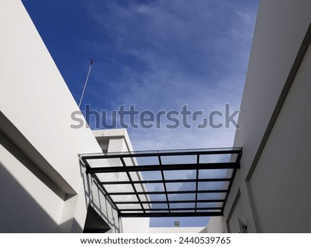 blue sky above the building Royalty-Free Stock Photo #2440539765
