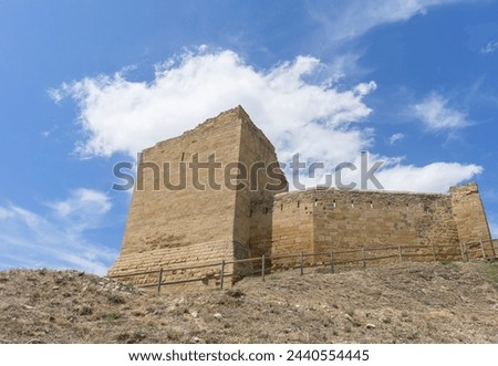 Castle of San Vicente de la Sonsierra in Rioja on a sunny day with blue sky photo taken from below, wide angle. Castle built in the 12th century