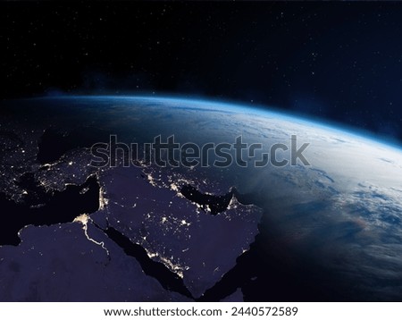 Planet Earth from the space at night. Near East and Africa, Arabian Peninsula, Egypt, Iraq, Iran, Israel, Jordan, Lebanon, Palestine, Gaza, Syria, and Turkey. Elements of this image furnished by NASA. Royalty-Free Stock Photo #2440572589