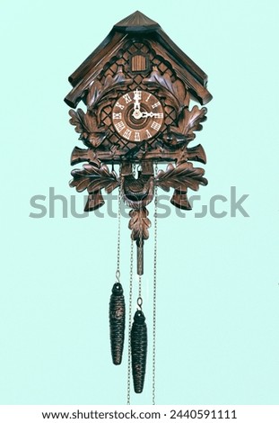 Old cuckoo clock on isolated background. 