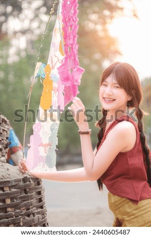 Little girl in the Songkran tradition in northern Thailand