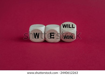 We will win symbol. Turned a cube and changes words we will to we win. Beautiful red background, copy space. Business, motivational and we will win concept. Royalty-Free Stock Photo #2440612263