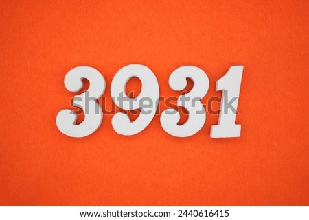 Orange felt is the background. The numbers 3931 are made from white painted wood.