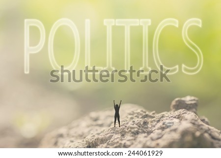 Concept of democracy with a person stand in the outdoor and looking up the text over the sky in nature background.