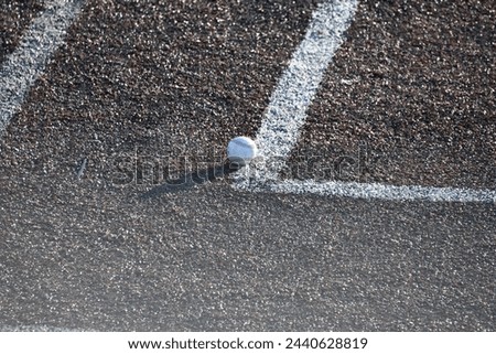 Baseball and chalk lines on a baseball field