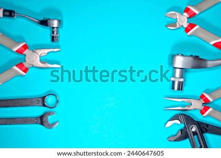 Tools kit detail close up instruments set of tools car kit on blue background Frame instruments for repair different construction tools Copy space Top view Men concept Dad day Father's holiday