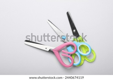 Various scissors for creativity on a white background