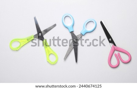 Various scissors for creativity on a white background