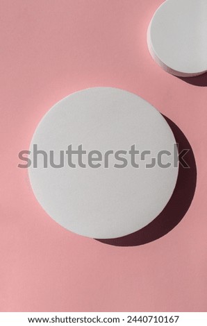 Round geometric shapes on the pink background. Copy space
