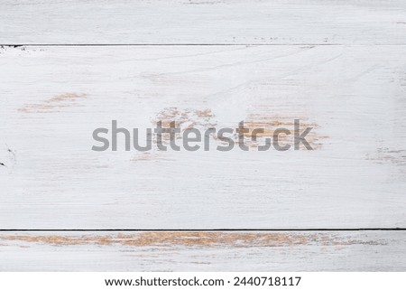 Table top view of bright blue faded wooden texture background. Image shot from overhead view.