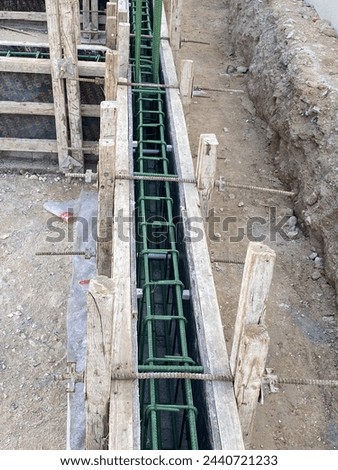 Ground beam shuttering work and ground beam reinforcement work of building, building sub structure work Royalty-Free Stock Photo #2440721233