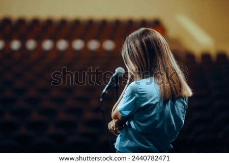 

Sad Woman Not Ready to Speak in Public Rehearsing. Unhappy speaker feeling overwhelmed and stressed out 
 Royalty-Free Stock Photo #2440782471