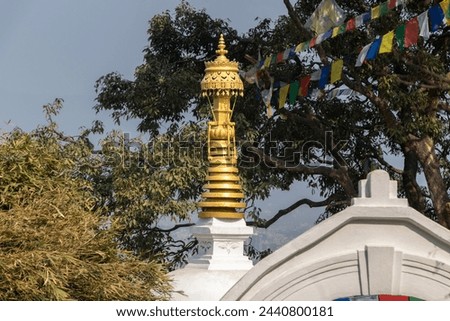 Small stupa with tree and sky as background at Swayambhunath, Kathmandu, Nepal