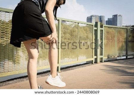 Middle aged woman suffering from knee ache,patella friction against the thigh bone,painful in the kneecap,Patellofemoral pain syndrome,problems of knee joint pain,feel discomfort,difficulty walking Royalty-Free Stock Photo #2440808069