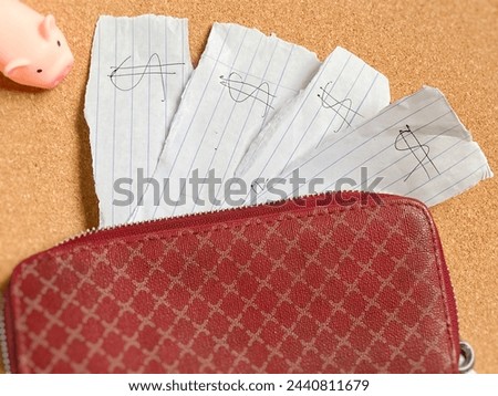 Dollar sign on torn paper with purse background. Stock photo.