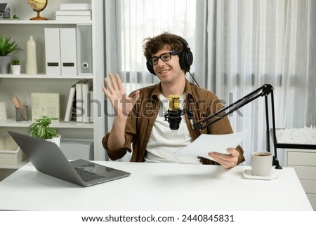 Host channel of influencer reading question script with listeners on social media with laptop in life coaching. Concept of radio online for consulting lifestyles at cozy studio modern office. Gusher.