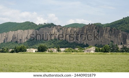 Penitents des Mees, interesting rock cliffs above village Mees, tourist landmark in France Royalty-Free Stock Photo #2440901879