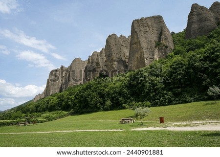 Penitents des Mees, interesting rock cliffs above village Mees, tourist landmark in France Royalty-Free Stock Photo #2440901881