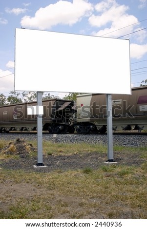 blank sign in front of train on move