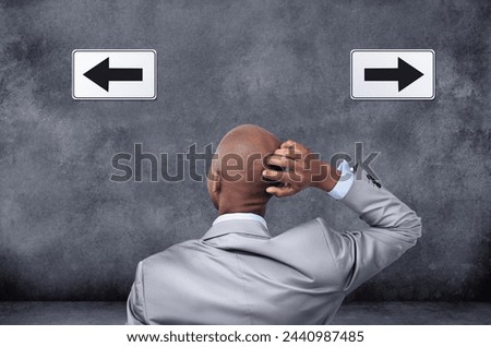 Businessman, thinking and arrows with choice for direction, selection or pick on a gray studio background. Rear view of confused black man, or employee with pointing icons in wonder, thought or ideas