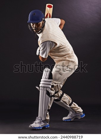 Man, cricket and athlete with sports bat in studio for professional match, competition or black background. Male person, gear and helmet with mockup space or fitness training, performance or game