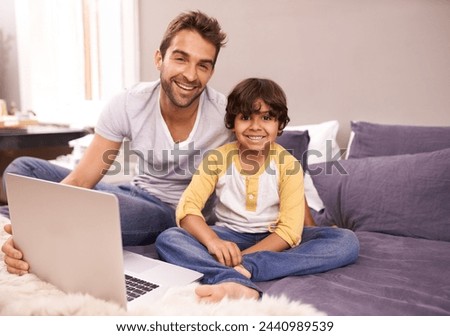 Portrait, father and child with laptop in bed for connectivity, technology and streaming online for cartoon. Family, man and young boy at home with computer, movie and bonding together in bedroom