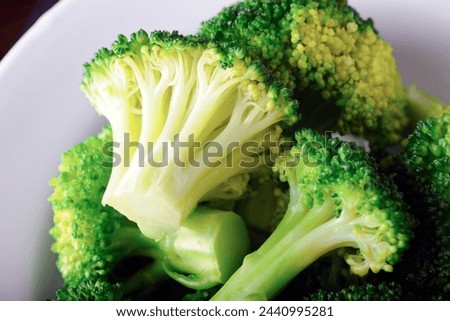 Close-Up 4K Ultra HD Image of Steam Cooked Broccoli on Plate - Stock Photography